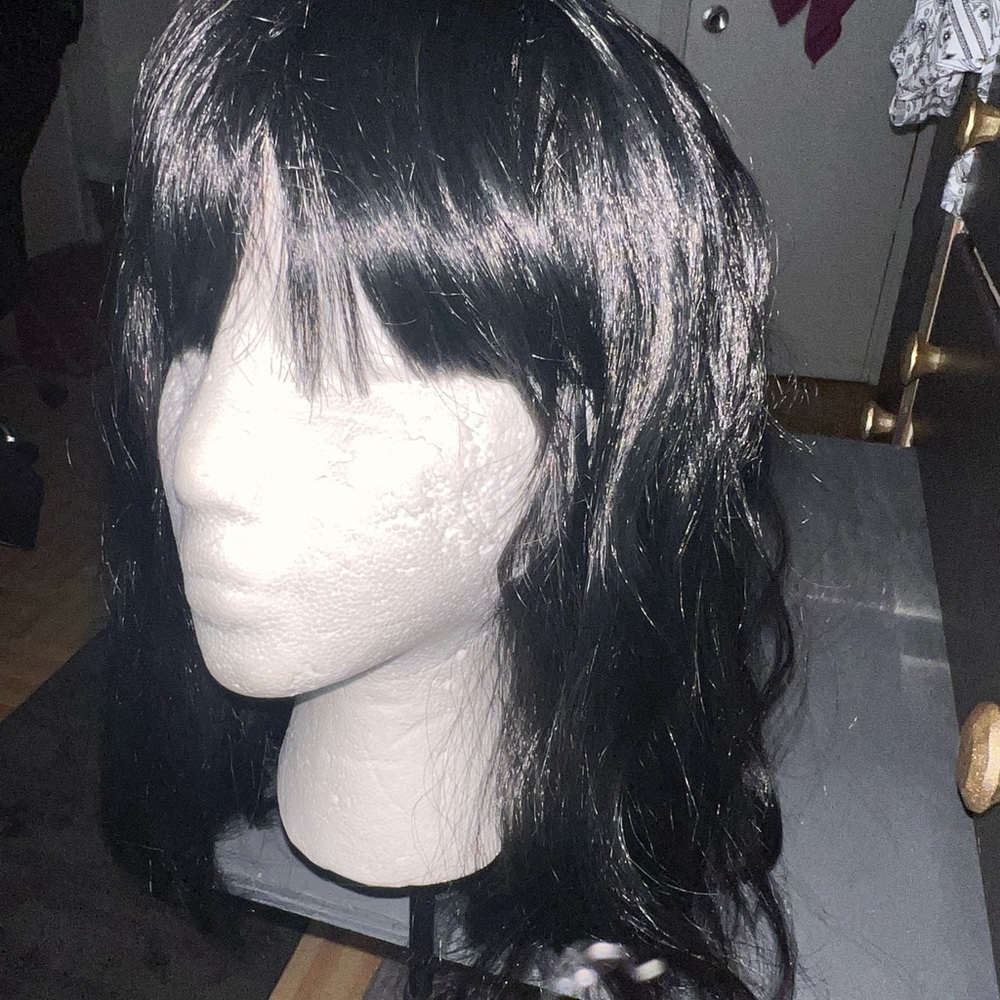 Women’s lose curl wig.